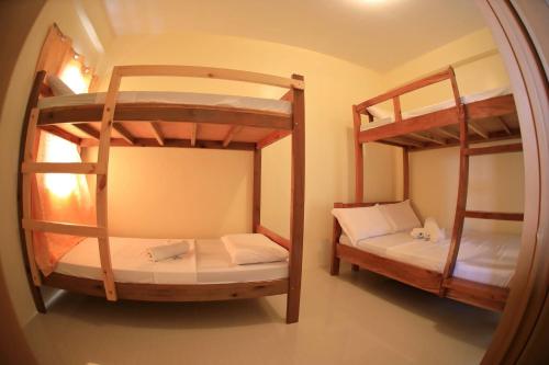 Postel nebo postele na pokoji v ubytování Baletin Hometel