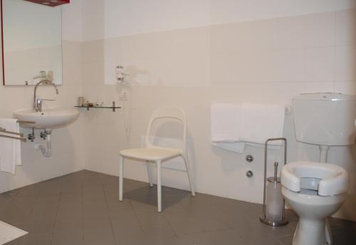 Vonios kambarys apgyvendinimo įstaigoje Hotel Lago Losetta