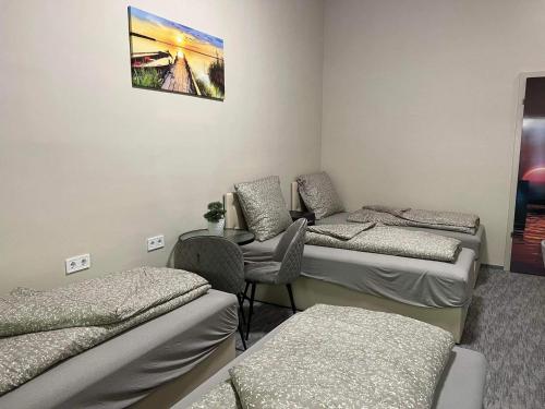 Zona de estar de Kinizsi Udvar Apartmanház