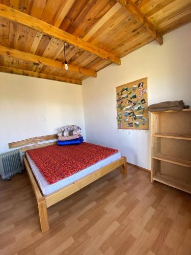 Postel nebo postele na pokoji v ubytování Eldos-Ata Eco Hotel