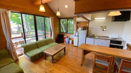 Kuchyň nebo kuchyňský kout v ubytování Tabinoteitaku Yakurai Cottage