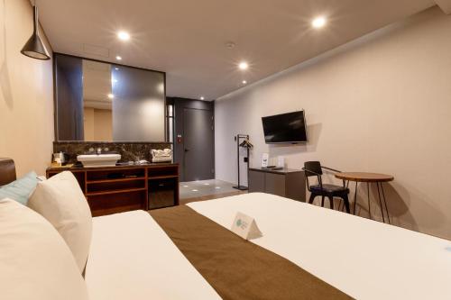 Μια τηλεόραση ή/και κέντρο ψυχαγωγίας στο Sorgente Business Hotel