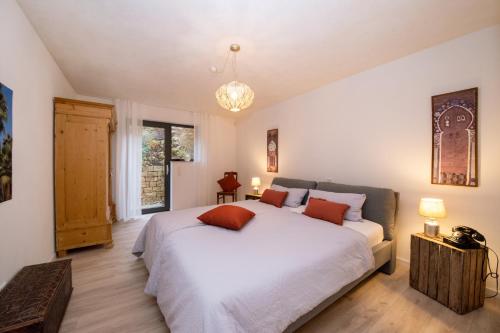 Ένα ή περισσότερα κρεβάτια σε δωμάτιο στο Art of living Mosel
