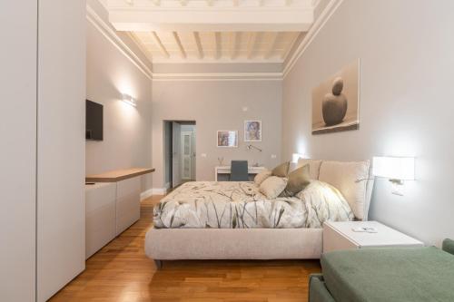 Postelja oz. postelje v sobi nastanitve Firenze Rentals Deluxe Corso 5