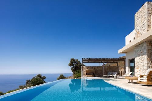 Πισίνα στο ή κοντά στο Melampes Villa