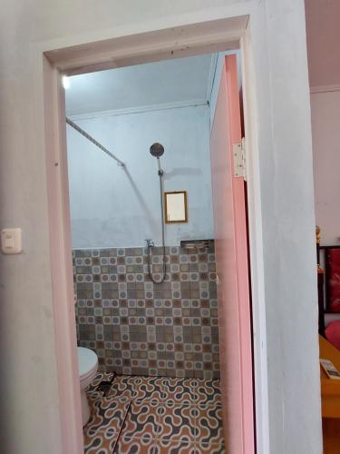 Koupelna v ubytování Harry & Mimin Homestay