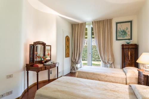 Ένα ή περισσότερα κρεβάτια σε δωμάτιο στο Villa Mimmina 8, Emma Villas