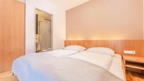 Postel nebo postele na pokoji v ubytování Appartement Berge