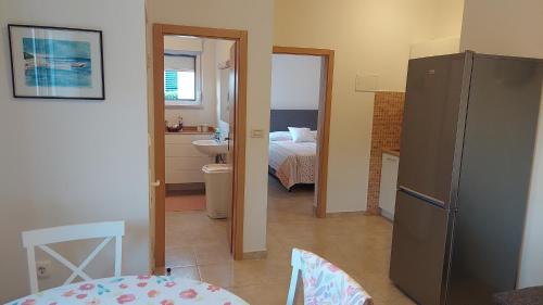 Кровать или кровати в номере Apartmani Meriko