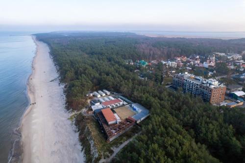 an aerial view of the shoreline of a beach at Na Wydmach Sea View by Renters Prestige in Międzywodzie
