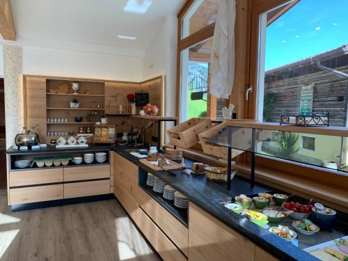 a kitchen with a counter with food on it at Heisshof in Schladming
