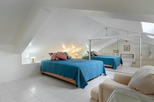 En eller flere senge i et værelse på Marina Views