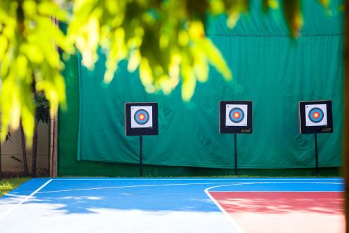 a tennis court with two targets on the court at Hyatt Regency Hua Hin in Hua Hin