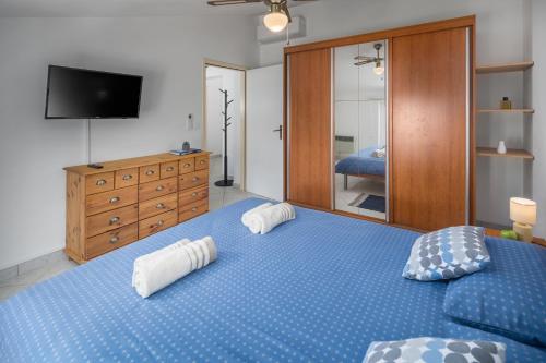 Säng eller sängar i ett rum på Relaxing Oasis near Porec