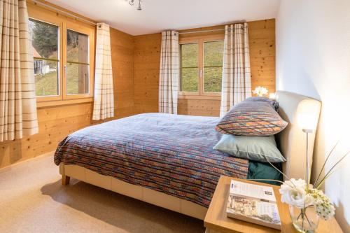 Postel nebo postele na pokoji v ubytování Chalet Bergrose 4