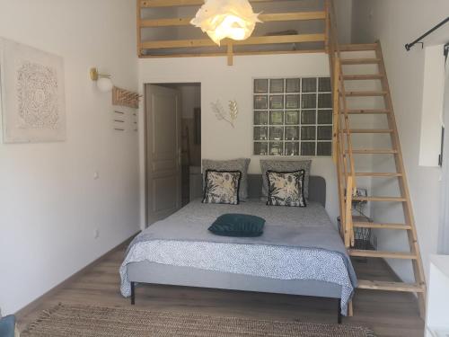 Postel nebo postele na pokoji v ubytování Le Mas Paolo