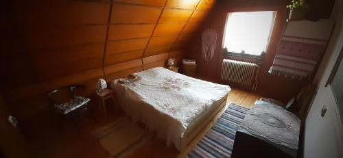 Postel nebo postele na pokoji v ubytování Chalupa Vršovka