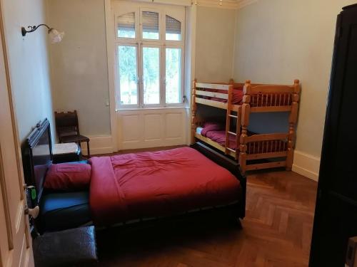 a bedroom with two bunk beds and a window at Best Price #B "LE SCHISTE" 7x room in Lods