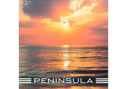 a sunset over the ocean with the words penninula at Peninsula Dar Bouazza Superbe appartement en résidence avec piscine activités in Dar Bouazza