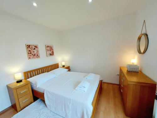 Postel nebo postele na pokoji v ubytování Apartman Anna