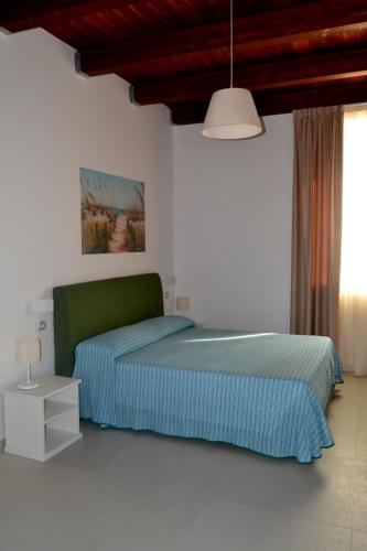 Una cama o camas en una habitación de Stellaris