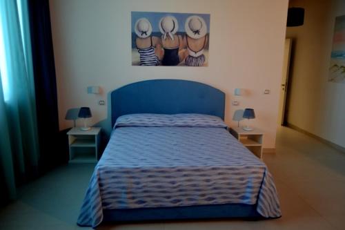 Una cama o camas en una habitación de Stellaris