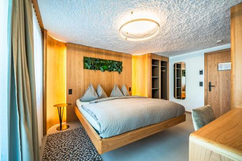 Postel nebo postele na pokoji v ubytování Boutique Hotel La Gorge