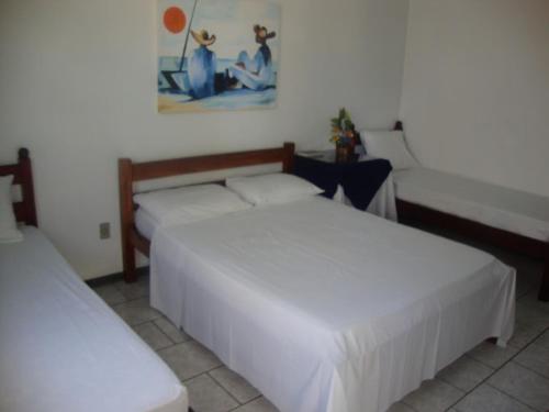 Hotel Pousada Terras do Sem Fimにあるベッド