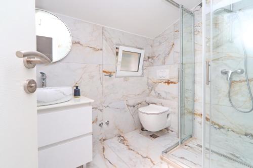 Et badeværelse på Villa Green Bay