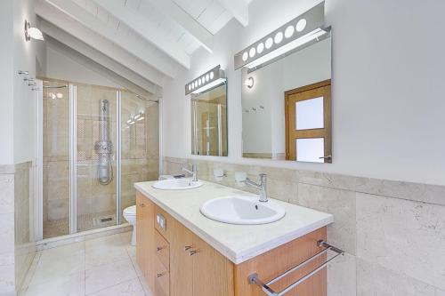 a bathroom with a sink and a shower at Romen 2-2 PENTHOUSE SEA VIEW & JACUZZI 2B in Palm-mar