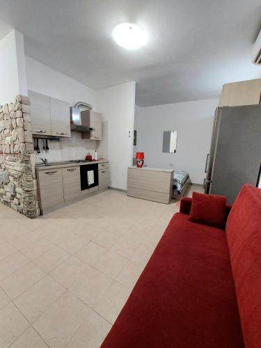 A cozinha ou cozinha compacta de Monolocale Cipri
