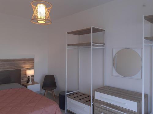 Postel nebo postele na pokoji v ubytování Villas Lago e Mare