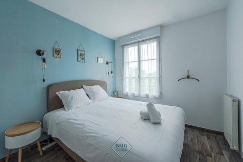 En eller flere senge i et værelse på Central park Disneyland BMYGUEST