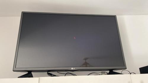 TV a/nebo společenská místnost v ubytování Estudio elegante y cálido