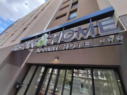 a sign on the front of a hospital building at Break & Home Clermont-Ferrand Les Carmes Dechaux in Clermont-Ferrand