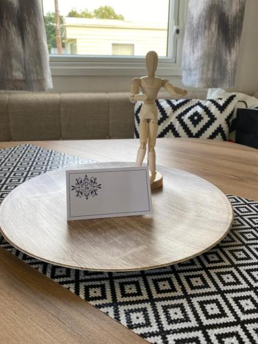 a toy mannequin on a table in a living room at Edinburgh, Seton Sands Abi Horizon in Edinburgh