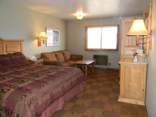מיטה או מיטות בחדר ב-New Summit Inn