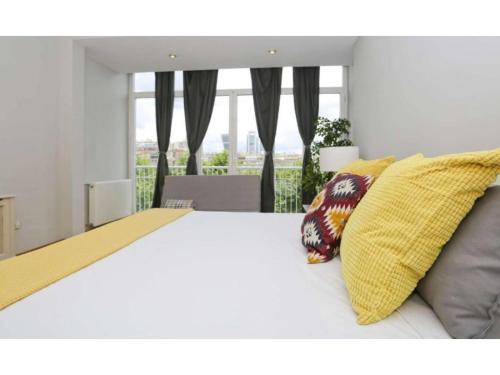 Vuode tai vuoteita majoituspaikassa Madrid Views Apartment