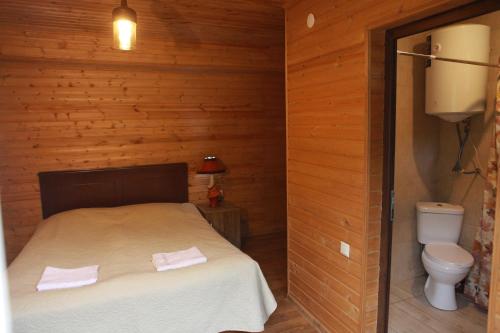 Ένα ή περισσότερα κρεβάτια σε δωμάτιο στο Cottage Woodside