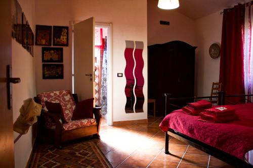 Postel nebo postele na pokoji v ubytování Villa Lancellotti