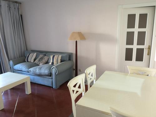 Posezení v ubytování PLANTA BAJA ACCESO DIRECTO A LA PLAYA