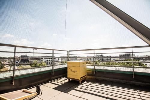 an empty balcony with a box on a building at ATLANTIC Hotel Airport in Bremen