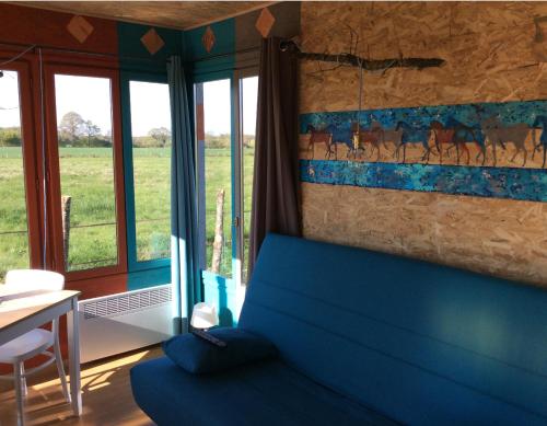 A seating area at Tiny House aux Chevaux du Perche