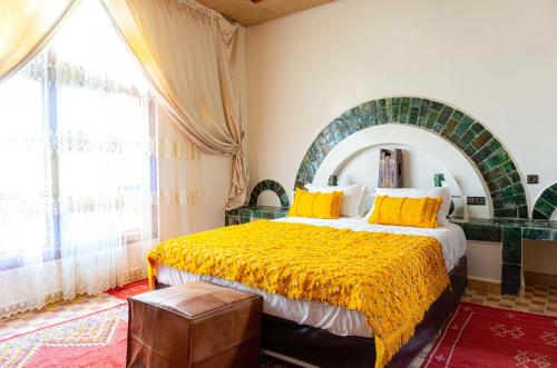 Postelja oz. postelje v sobi nastanitve Riad Zagora Palms