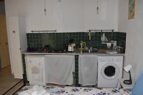 Kuchyňa alebo kuchynka v ubytovaní atocà3 casa vacanze - vedi anche atocà1 e atocà2