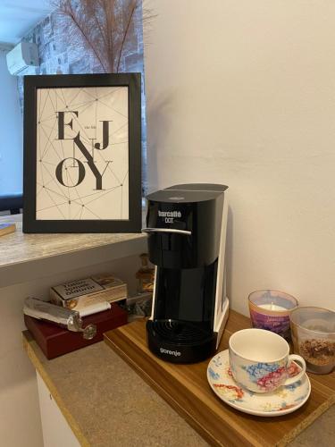 Tetera y cafetera en Book home