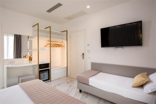 Hotel Cenisioにあるベッド