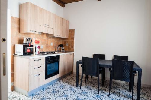 Kuchyň nebo kuchyňský kout v ubytování Palazzo ReSilente
