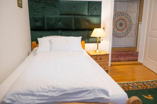 Łóżko lub łóżka w pokoju w obiekcie NATURION Hotel Hinterzarten