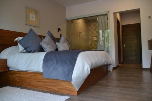 Quinta Tere Hotel & Galleryにあるベッド